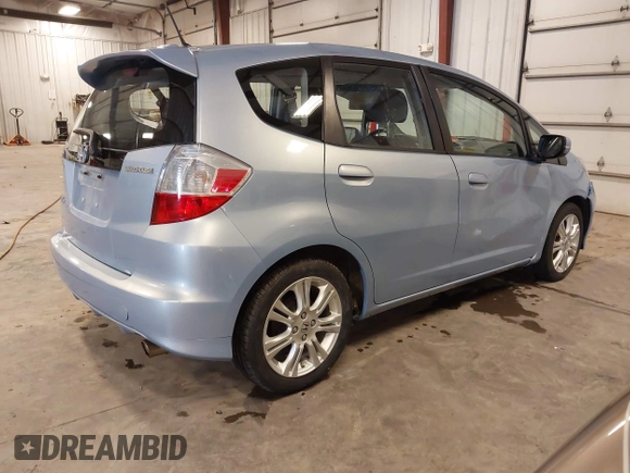 2009 Honda Fit Sport with VIN JHMGE88489S005033, listed as a IAAI auction lot 41861124 with 56,148 mi miles and . Bid and sale history available at DreamBid. Image 4.