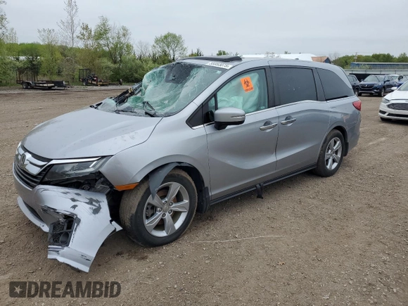 2019 Honda Odyssey EX-L z VIN 5FNRL6H7XKB049729, wystawiony jako Copart lot #55953075 z przebiegiem 129 194 mil mil oraz Szkoda całkowita • Salvage title. Historia ofert i sprzedaży dostępna na DreamBid. Obrazek 1.