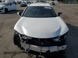 2022 Lexus UX 250h with VIN JTHX9JBH2N2056285, listed as a Copart auction lot 87221214 with 33,377 mi miles and Salvage title. Bid and sale history available at DreamBid. Image 5.