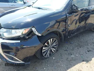 2019 Mitsubishi Outlander SE with VIN JA4AD3A33KZ005401, listed as a IAAI auction lot 42270895 with 58,080 mi miles and . Bid and sale history available at DreamBid. Image 6.