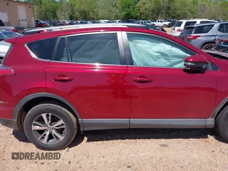 2018 Toyota RAV4 XLE with VIN 2T3WFREVXJW434957, listed as a IAAI auction lot 42002561 with 111,590 mi miles and . Bid and sale history available at carsss.com. Image 13.