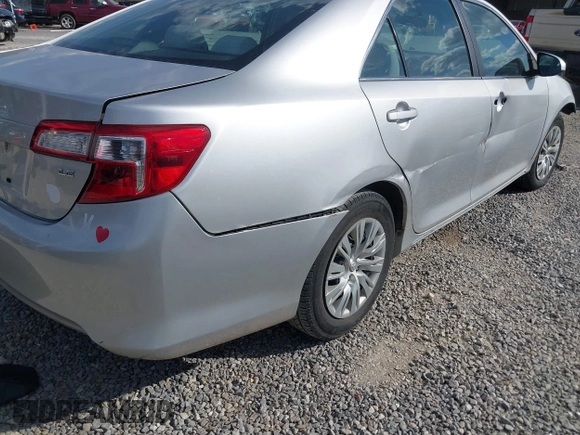 2014 Toyota Camry L with VIN 4T1BF1FK3EU301041, listed as a IAAI auction lot 41858386 with 136,998 mi miles and . Bid and sale history available at DreamBid. Image 19.