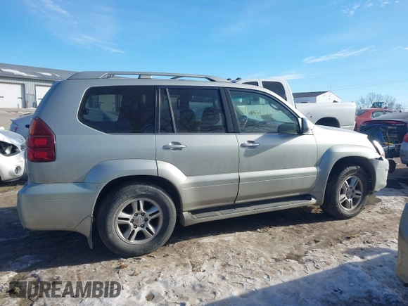 2003 Lexus GX 470 with VIN JTJBT20XX30015034, listed as a IAAI auction lot 41386690 with 234,983 mi miles. Bid and sale history available at carsss.com. Image 13.