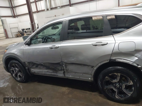 2017 Honda CR-V Touring with VIN 2HKRW2H90HH603307, listed as a IAAI auction lot 41868564 with 81,144 mi miles. Bid and sale history available at carsss.com. Image 14.