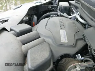 2021 Honda Pilot Touring 7-Passenger z VIN 5FNYF6H69MB005833, wystawiony jako IAAI lot #42299145 z przebiegiem 66 621 mil mil oraz . Historia ofert i sprzedaży dostępna na DreamBid. Obrazek 19.