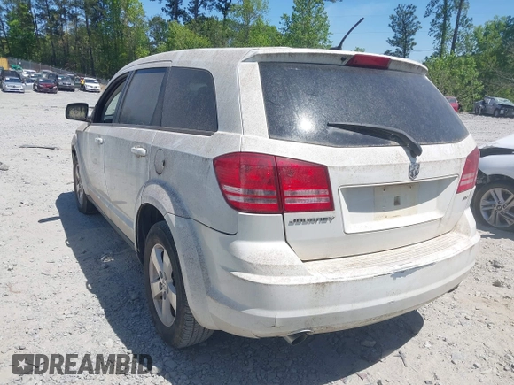 2009 Dodge Journey SXT with VIN 3D4GG57VX9T200489, listed as a IAAI auction lot 42048965 with 156,830 mi miles. Bid and sale history available at carsss.com. Image 3.