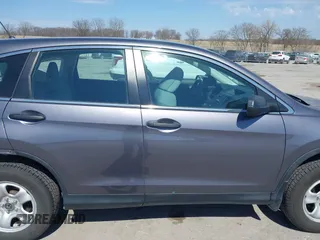 2016 Honda CR-V LX with VIN 5J6RM4H3XGL135927, listed as a IAAI auction lot 41899292 with 165,000 mi miles. Bid and sale history available at carsss.com. Image 14.
