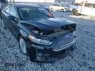 2015 Ford Fusion SE Hybrid с VIN 3FA6P0LU7FR228189, выставлен на аукционе Copart как лот 79744174 с пробегом Не указан миль и Списание • Salvage title. История ставок и продаж доступна на DreamBid. Изображение 11.