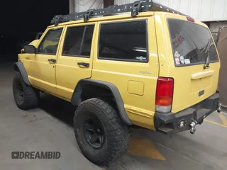 2001 Jeep Cherokee Sport with VIN 1J4FF48S41L580319, listed as a IAAI auction lot 42064564 with 257,534 mi miles and . Bid and sale history available at DreamBid. Image 3.