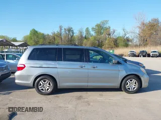2007 Honda Odyssey EX-L with VIN 5FNRL387X7B140294, listed as a IAAI auction lot 41995795 with 202,934 mi miles. Bid and sale history available at carsss.com. Image 13.