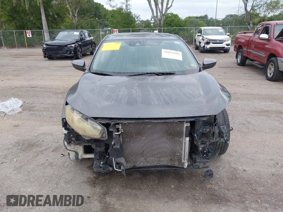 2019 Honda Civic Sedan LX with VIN 19XFC2F66KE024399, listed as a IAAI auction lot 42023498 with 50,173 mi miles. Bid and sale history available at carsss.com. Image 12.