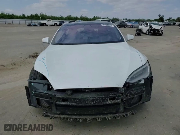 2018 Tesla Model S 75D z VIN 5YJSA1E27JF247900, wystawiony jako Copart lot #52014375 z przebiegiem 106 670 mil mil oraz Szkoda całkowita • Salvage title. Historia ofert i sprzedaży dostępna na DreamBid. Obrazek 11.