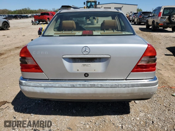 1995 Mercedes-Benz C with VIN WDBHA28E7SF255142, listed as a Copart auction lot 68411704 with 334,000 mi miles and Salvage Title. Bid and sale history available at carsss.com. Image 6.