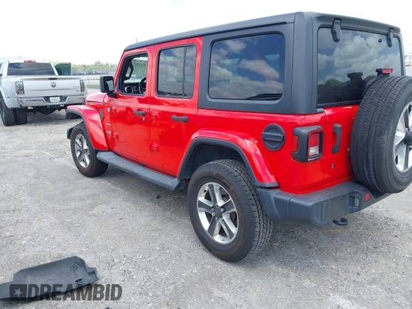 2019 Jeep Wrangler Unlimited Sahara with VIN 1C4HJXEG4KW573157, listed as a IAAI auction lot 42118373 with 105,890 mi miles and . Bid and sale history available at DreamBid. Image 3.