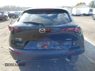 2022 Mazda CX-30 S with VIN 3MVDMBALXNM402265, listed as a IAAI auction lot 41458605 with 76,291 mi miles and . Bid and sale history available at carsss.com. Image 16.