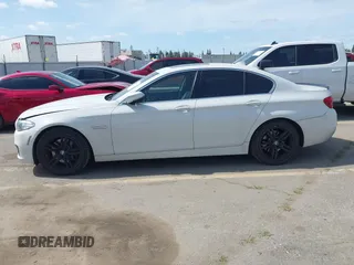 2015 BMW 5 Series 535i with VIN WBA5B1C58FG128061, listed as a IAAI auction lot 41838117 with 97,131 mi miles and . Bid and sale history available at carsss.com. Image 14.