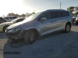 2018 Chrysler Pacifica Touring L с VIN 2C4RC1BG7JR246372, выставлен на аукционе Copart как лот 51141305 с пробегом 127 104 миль миль и На запчасти • Non repairable. История ставок и продаж доступна на DreamBid. Изображение 1.