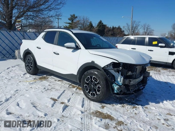 2024 Hyundai Santa Cruz SEL z VIN 5NTJCDAE2RH093666, wystawiony jako IAAI lot #41639659 z przebiegiem 28 599 mil mil oraz . Historia ofert i sprzedaży dostępna na DreamBid. Obrazek 1.