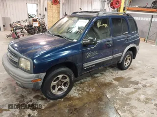 2003 Chevrolet Tracker ZR2 z VIN 2CNBJ734736905310, wystawiony jako IAAI lot #41519431 z przebiegiem 177 643 mil mil oraz . Historia ofert i sprzedaży dostępna na DreamBid. Obrazek 2.