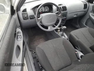 2003 Hyundai Accent GL with VIN KMHCG35C53U258469, listed as a Copart auction lot 82977294 with 99,136 mi miles and Clean Title. Bid and sale history available at carsss.com. Image 8.