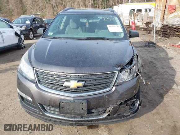 2015 Chevrolet Traverse LS z VIN 1GNKVFEDXFJ134436, wystawiony jako IAAI lot #41773596 z przebiegiem 156 326 mil mil oraz . Historia ofert i sprzedaży dostępna na DreamBid. Obrazek 13.