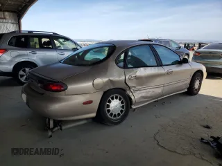 1998 Ford Taurus SE Comfort with VIN 1FAFP53S3WG213045, listed as a Copart auction lot 61653315 with 111,014 mi miles and Salvage title. Bid and sale history available at DreamBid. Image 3.