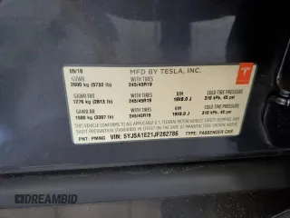 2018 Tesla Model S 75D with VIN 5YJSA1E21JF282786, listed as a Copart auction lot 58058595 with 65,982 mi miles and Salvage title. Bid and sale history available at DreamBid. Image 12.