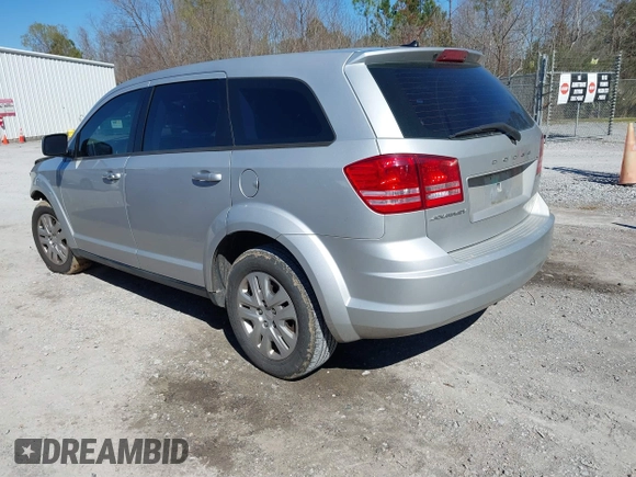 2014 Dodge Journey American Value Pkg with VIN 3C4PDCAB7ET259230, listed as a IAAI auction lot 41675179 with 151,386 mi miles. Bid and sale history available at carsss.com. Image 3.