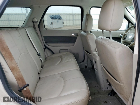 2010 Mercury Mariner Premier с VIN 4M2CN8HG7AKJ29917, выставлен на аукционе Copart как лот 63306425 с пробегом 288 075 миль миль и Списание • Salvage title. История ставок и продаж доступна на DreamBid. Изображение 11.
