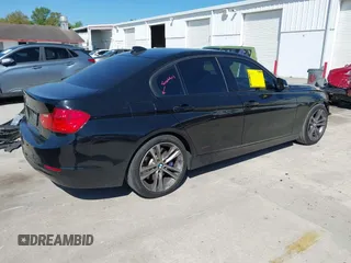 2015 BMW 3 Series 328i with VIN WBA3C1C54FP116669, listed as a IAAI auction lot 41786927 with 158,320 mi miles and . Bid and sale history available at carsss.com. Image 4.