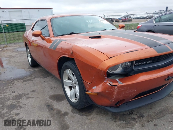 2011 Dodge Challenger with VIN 2B3CJ4DG0BH511006, listed as a IAAI auction lot 39189464 with 148,139 mi miles. Bid and sale history available at carsss.com. Image 6.