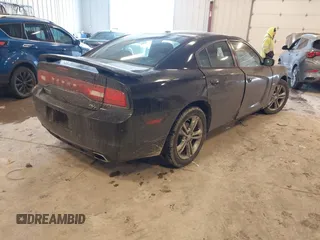 2014 Dodge Charger RT with VIN 2C3CDXDT5EH248671, listed as a IAAI auction lot 41430969 with 173,167 mi miles. Bid and sale history available at carsss.com. Image 4.