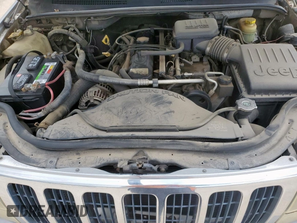 2003 Jeep Grand Cherokee Laredo with VIN 1J4GX48S13C609036, listed as a Copart auction lot 63143505 with 127,188 mi miles and Clean title. Bid and sale history available at DreamBid. Image 12.