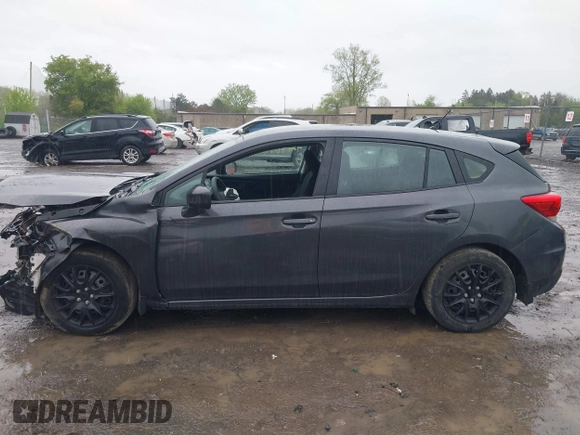 2018 Subaru Impreza with VIN 4S3GTAA67J3728185, listed as a IAAI auction lot 42140197 with 77,090 mi miles and . Bid and sale history available at DreamBid. Image 14.