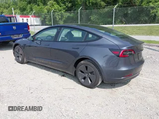 2023 Tesla Model 3 with VIN 5YJ3E1EA2PF566047, listed as a IAAI auction lot 42481008 with 21,143 mi miles and . Bid and sale history available at DreamBid. Image 3.