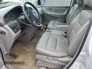 2003 Honda Odyssey EX-L z VIN 5FNRL18983B043014, wystawiony jako Copart lot #52568405 z przebiegiem 194 266 mil mil oraz Czysty tytuł • Clean title. Historia ofert i sprzedaży dostępna na DreamBid. Obrazek 7.