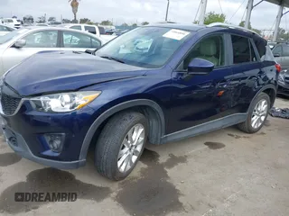 2014 Mazda CX-5 Grand Touring with VIN JM3KE2DY1E0307911, listed as a IAAI auction lot 42064898 with 133,934 mi miles. Bid and sale history available at carsss.com. Image 19.