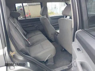 2007 Jeep Commander Sport with VIN 1J8HG48P27C589142, listed as a IAAI auction lot 42379721 with 162,397 mi miles and . Bid and sale history available at DreamBid. Image 8.