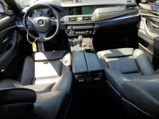 2013 BMW 5 Series 550i xDrive z VIN WBAFU9C54DDY72476, wystawiony jako Copart lot #56338925 z przebiegiem 76 018 mil mil oraz Szkoda całkowita • Salvage title. Historia ofert i sprzedaży dostępna na DreamBid. Obrazek 8.