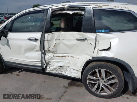 2016 Honda Pilot Elite with VIN 5FNYF6H00GB104329, listed as a IAAI auction lot 41905390 with 125,501 mi miles. Bid and sale history available at carsss.com. Image 6.