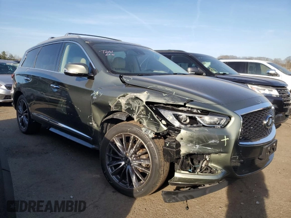 2017 Infiniti QX60 with VIN 5N1DL0MM6HC513197, listed as a Copart auction lot 48238615 with 101,015 mi miles and Salvage Title. Bid and sale history available at DreamBid. Image 4.