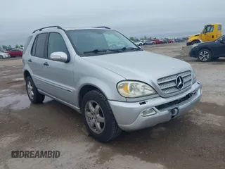 2004 Mercedes-Benz M-Class 3.5L with VIN 4JGAB57E24A490997, listed as a IAAI auction lot 41954815 with 226,635 mi miles. Bid and sale history available at carsss.com. Image 1.
