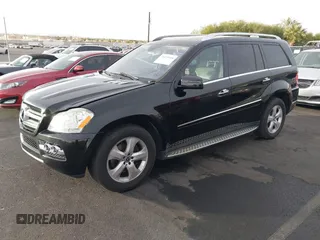 2011 Mercedes-Benz GL-Class GL 450 with VIN 4JGBF7BE1BA752615, listed as a IAAI auction lot 41075508 with 165,605 mi miles. Bid and sale history available at carsss.com. Image 2.