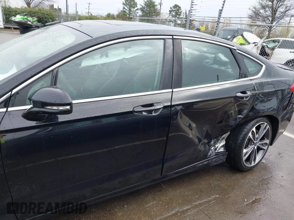 2019 Ford Fusion Titanium with VIN 3FA6P0K93KR243148, listed as a IAAI auction lot 41757469 with 78,859 mi miles. Bid and sale history available at carsss.com. Image 14.