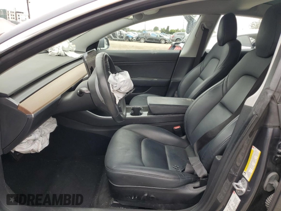 2018 Tesla Model 3 Long Range Battery z VIN 5YJ3E1EA7JF123805, wystawiony jako Copart lot #56034325 z przebiegiem 90 249 mil mil oraz Szkoda całkowita • Salvage title. Historia ofert i sprzedaży dostępna na DreamBid. Obrazek 7.