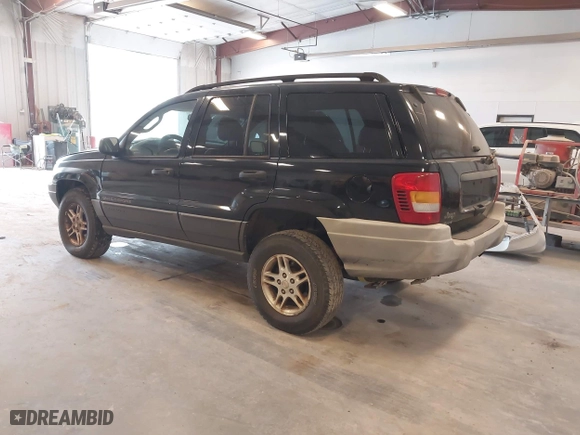 2002 Jeep Grand Cherokee Laredo with VIN 1J4GW48SX2C118434, listed as a IAAI auction lot 42036464 with 187,263 mi miles. Bid and sale history available at carsss.com. Image 3.