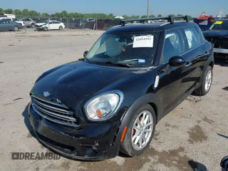 2015 MINI Countryman with VIN WMWZB3C54FWM33074, listed as a IAAI auction lot 42094992 with 86,704 mi miles and . Bid and sale history available at DreamBid. Image 18.