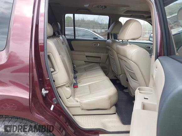 2009 Honda Pilot EX-L with VIN 5FNYF486X9B026041, listed as a IAAI auction lot 41942718 with 219,301 mi miles and . Bid and sale history available at carsss.com. Image 8.