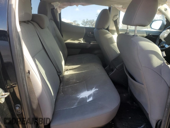 2017 Toyota Tacoma SR5 z VIN 3TMDZ5BN2HM026640, wystawiony jako Copart lot #76337144 z przebiegiem Nie podano mil oraz Szkoda całkowita • Salvage title. Historia ofert i sprzedaży dostępna na DreamBid. Obrazek 10.