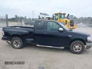 2000 Ford F-150 XL with VIN 1FTRX07W9YKB27455, listed as a IAAI auction lot 42197973 with 211,160 mi miles and . Bid and sale history available at DreamBid. Image 13.